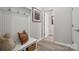 Bright entryway with built-in bench, storage, and hooks at 3120 Beacon Heights Rd, Indian Land, SC 29707