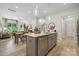 Modern kitchen with gray cabinetry and island at 3120 Beacon Heights Rd, Indian Land, SC 29707