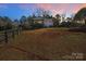 Spacious backyard with a fenced area and view of the house at 3433 Grey Rd, Davidson, NC 28036