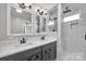 Modern bathroom with double vanity and walk-in shower at 3433 Grey Rd, Davidson, NC 28036
