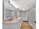 Basement bathroom with double vanity and tub shower combo at 3433 Grey Rd, Davidson, NC 28036