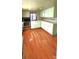 Small kitchen with light green cabinets and wood-look floors at 3706 2Nd Nw Ave, Hickory, NC 28601