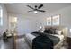 Spacious main bedroom featuring a ceiling fan, closet, and en suite bathroom at 6305 Dale Ave, Charlotte, NC 28212