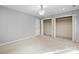 Spacious bedroom with double closets and neutral wall colors at 69 Honeysuckle Woods, Clover, SC 29710