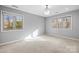 Bright bedroom with carpeting, large windows, and a chandelier at 69 Honeysuckle Woods, Clover, SC 29710