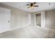 Well-lit bedroom featuring a ceiling fan and ample closet space at 69 Honeysuckle Woods, Clover, SC 29710