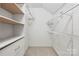 Spacious walk-in closet with ample shelving and hanging rods at 69 Honeysuckle Woods, Clover, SC 29710