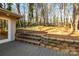 Deck with stone retaining wall and steps at 69 Honeysuckle Woods, Clover, SC 29710