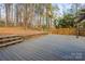 Spacious gray deck with stairs and wooden fence at 69 Honeysuckle Woods, Clover, SC 29710