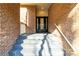 Brick entryway with modern door and gray steps leading up to the home at 69 Honeysuckle Woods, Clover, SC 29710
