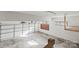 Spacious garage interior with overhead storage and a white door at 69 Honeysuckle Woods, Clover, SC 29710