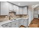 Modern kitchen with gray cabinets and granite counters at 69 Honeysuckle Woods, Clover, SC 29710