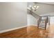 Spacious living area with hardwood floors and open staircase at 69 Honeysuckle Woods, Clover, SC 29710