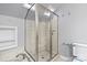 Walk-in shower with glass enclosure and skylight at 69 Honeysuckle Woods, Clover, SC 29710