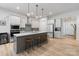 Modern kitchen featuring a large center island, stainless steel appliances, and plenty of storage space at 8016 Brookbank Dr, Charlotte, NC 28269