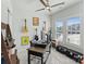 Well-lit office featuring a ceiling fan, and music themed wall decor, creating an inspiring workspace at 8016 Brookbank Dr, Charlotte, NC 28269