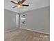 An interior shot of a bedroom with carpet and a window at 1080 Nalley Rd, Rock Hill, SC 29732