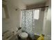 Small bathroom with shower/tub combo and vinyl flooring at 1108 Cone Ave, Pineville, NC 28134