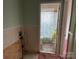 Small bathroom with shower/tub combo and dated decor at 1108 Cone Ave, Pineville, NC 28134