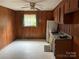 Full view of the retro kitchen with wood cabinets at 1108 Cone Ave, Pineville, NC 28134