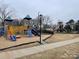 Colorful playground equipment at a park at 1108 Cone Ave, Pineville, NC 28134