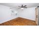 Hardwood floor bedroom with window and ceiling fan at 1250 Reese Roach Rd, Rock Hill, SC 29730