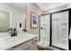 Modern bathroom with a glass enclosed shower, a single vanity with a framed mirror, and contemporary fixtures at 128 Ballantree Rd # 46, Mooresville, NC 28115