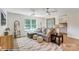 Stylish living room featuring a comfortable sectional sofa and bright window at 128 Ballantree Rd # 46, Mooresville, NC 28115