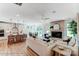 Open-concept living room and kitchen with hardwood floors and lots of sunlight at 128 Ballantree Rd # 46, Mooresville, NC 28115