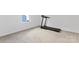 Exercise room with a treadmill and neutral carpeting at 14247 Canemeadow Dr, Charlotte, NC 28278