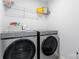 Laundry room with modern Samsung washer and dryer at 14247 Canemeadow Dr, Charlotte, NC 28278