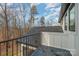 A private balcony overlooks a wooded area and the house's roof at 177 Olympia Dr, Mooresville, NC 28117