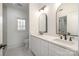 Elegant bathroom with double vanity, modern fixtures, and plenty of natural light at 177 Olympia Dr, Mooresville, NC 28117