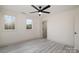 Light and airy bedroom with two large windows and modern light fixture at 177 Olympia Dr, Mooresville, NC 28117