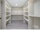 Spacious walk-in closet with custom shelving for optimal organization and storage at 177 Olympia Dr, Mooresville, NC 28117