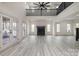 Spacious living room with fireplace, lots of natural light, ceiling fan and sleek finishes at 177 Olympia Dr, Mooresville, NC 28117