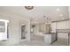 Open floor plan featuring a dining area and a kitchen with a gray island at 177 Olympia Dr, Mooresville, NC 28117