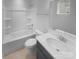 Bathroom with a tub, shower, toilet and vanity at 2124 Electric Ln, Charlotte, NC 28205