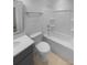 Clean bathroom with tub shower combo and gray vanity at 2124 Electric Ln, Charlotte, NC 28205