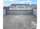 Private rooftop deck with gray pavers and city views at 2124 Electric Ln, Charlotte, NC 28205