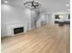 Spacious living room with fireplace and hardwood floors at 2124 Electric Ln, Charlotte, NC 28205