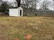 Large backyard with storage shed and privacy fence at 2334 Woodleaf Dr, Gastonia, NC 28052