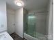 Modern bathroom with a glass enclosed shower and modern vanity at 2334 Woodleaf Dr, Gastonia, NC 28052