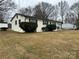 Updated ranch home with black trim and neat landscaping at 2334 Woodleaf Dr, Gastonia, NC 28052