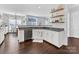 Modern kitchen island with granite countertop and stainless steel dishwasher at 278 Corona Cir, Mooresville, NC 28117