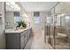 Bathroom with double vanity, soaking tub, and walk-in shower at 3122 Beacon Heights Rd, Indian Land, SC 29707