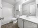 Bathroom features tub, toilet, vanity, and a medicine cabinet at 3522 Larkhaven Village Dr, Charlotte, NC 28215