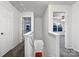 Bright hallway with access to bedrooms and stairs at 3522 Larkhaven Village Dr, Charlotte, NC 28215