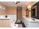 Double vanity bathroom with modern finishes and a large soaking tub at 395 Paulownia Dr, China Grove, NC 28023