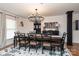 Formal dining room with chandelier and dark wood table at 395 Paulownia Dr, China Grove, NC 28023